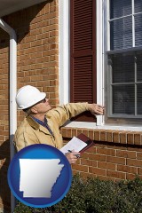 arkansas map icon and a building inspector inspecting home windows